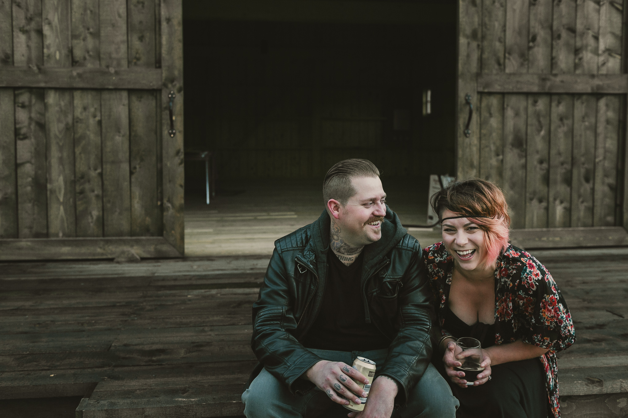 couple sitting on the steps laughing