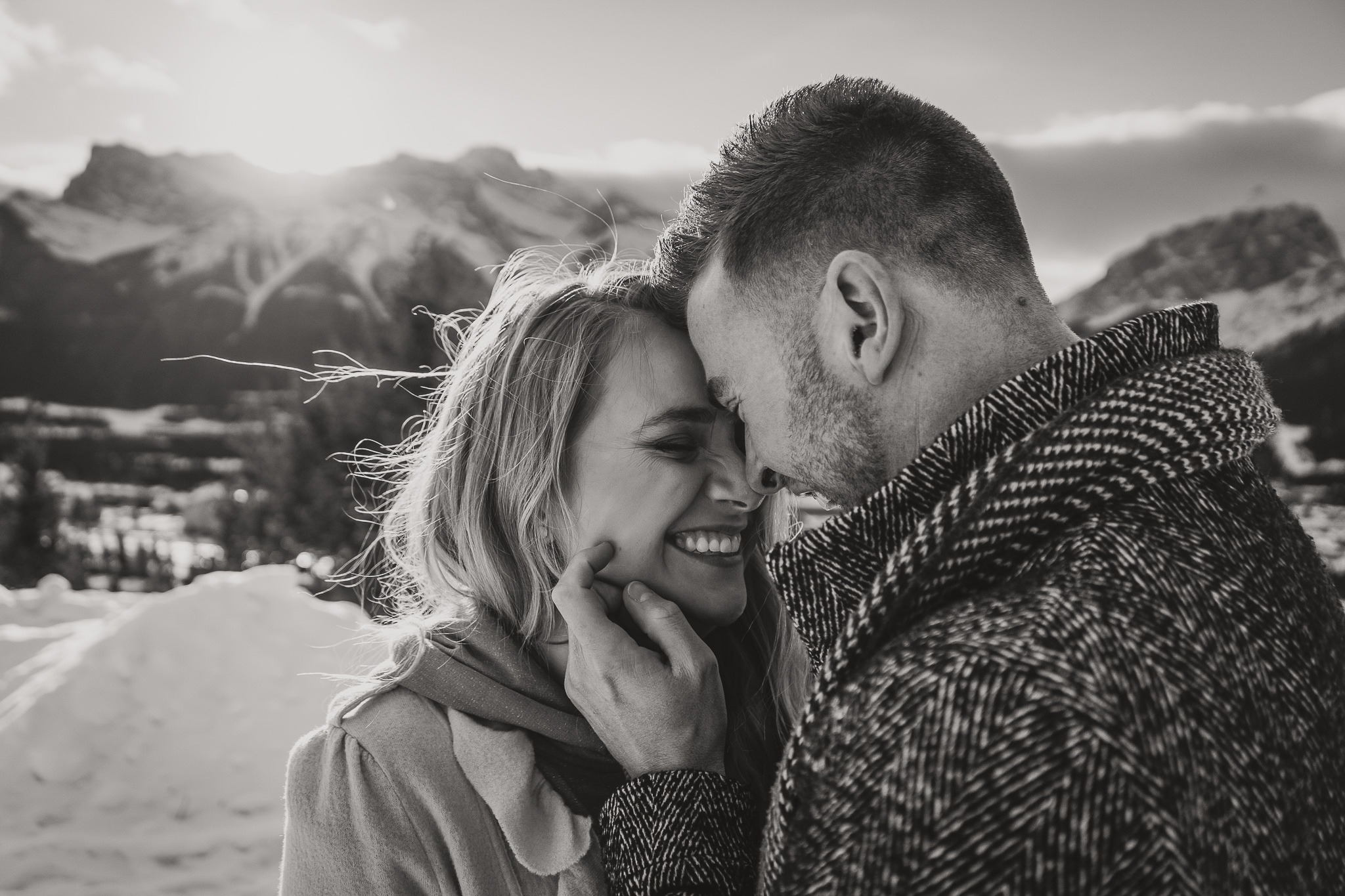 man holding woman's face