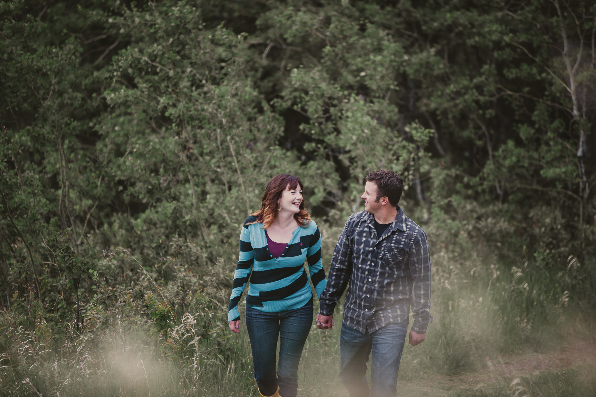 man and woman walking and talking