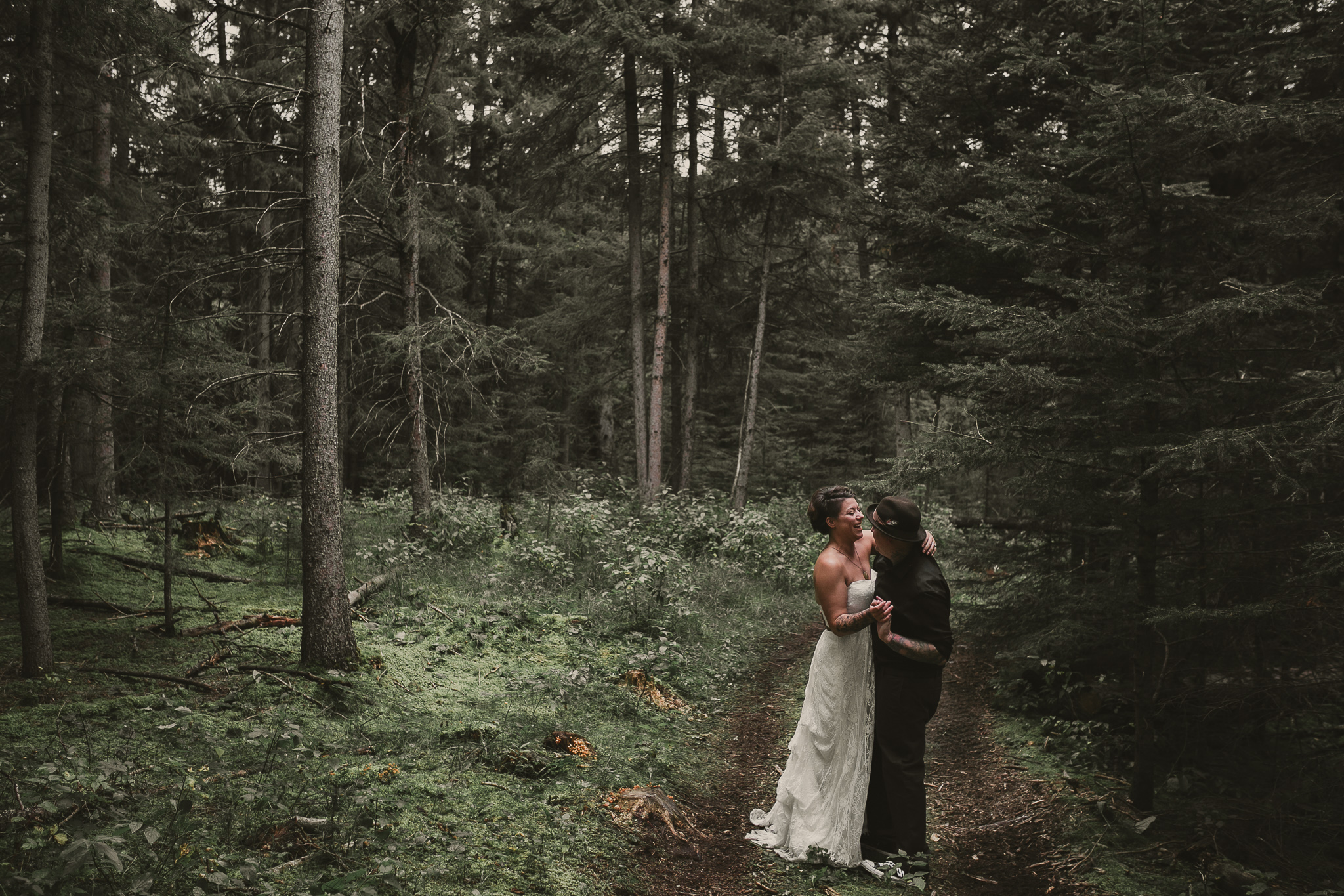 wedding couple dancing in the forest