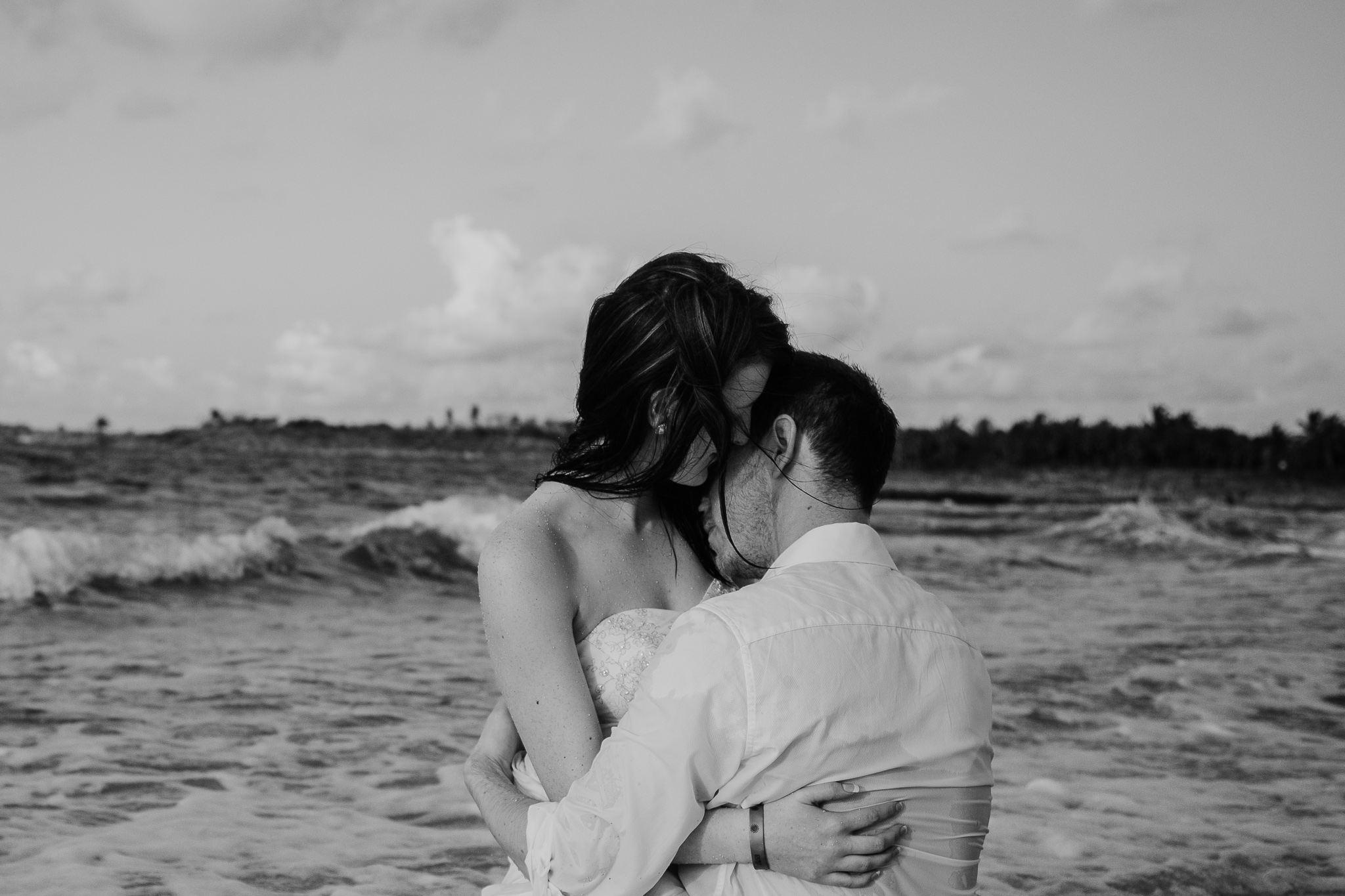 couple hugging in the water